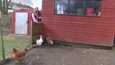 Nicole Holt and chickens