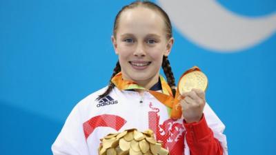 Ellie Robinson with her gold medal