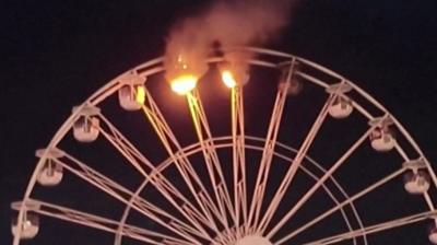 Ferris wheel ablaze