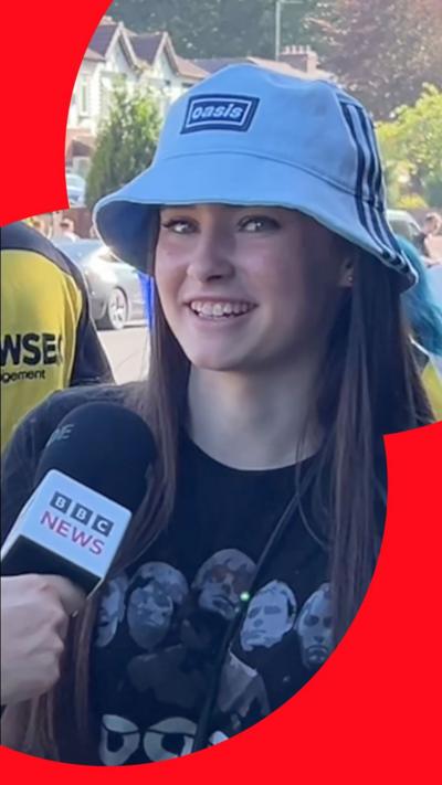 Teenage girl in Oasis bucket hat and t-shirt