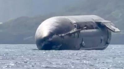 SpaceX rocket floating on the ocean
