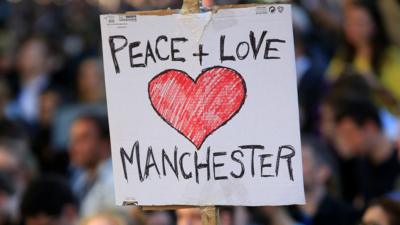 "Peace + Love Manchester" sign