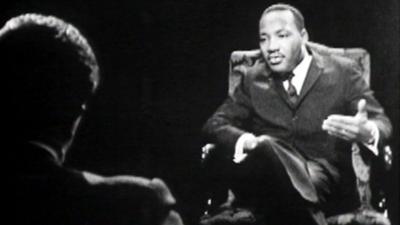 Martin Luther King sits opposite John Freeman