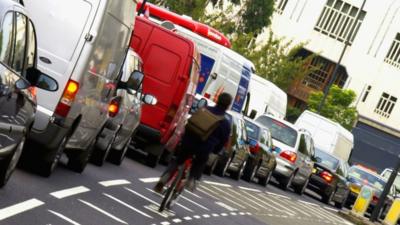 Commuters in traffic jam