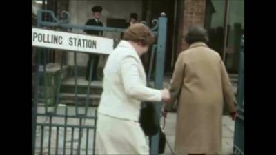 women outside polling station in 1975