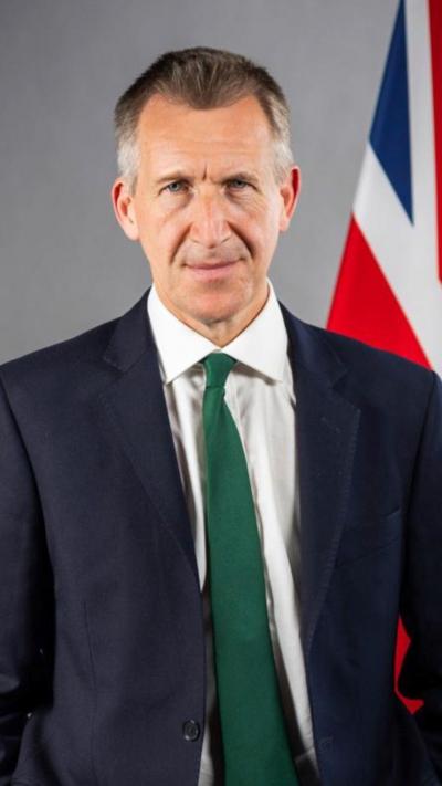 Dan Jarvis in suit and green tie