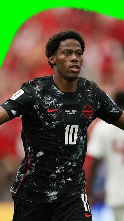 Jonathan David celebrates scoring for Canada