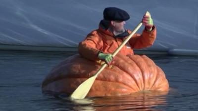 Tom Pearcy in his pumpkin boat