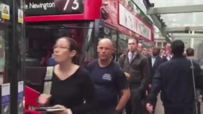 People queuing at Victoria station