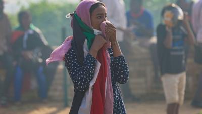 Protesters gather outside the Presidential Palace during a demonstration demanding civilian rule in Sudan