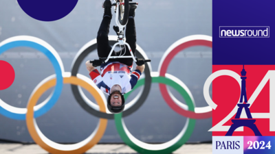 BMX rider upside down on a bike in Tokyo 2020