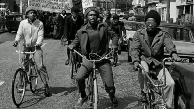 Men on bicycles