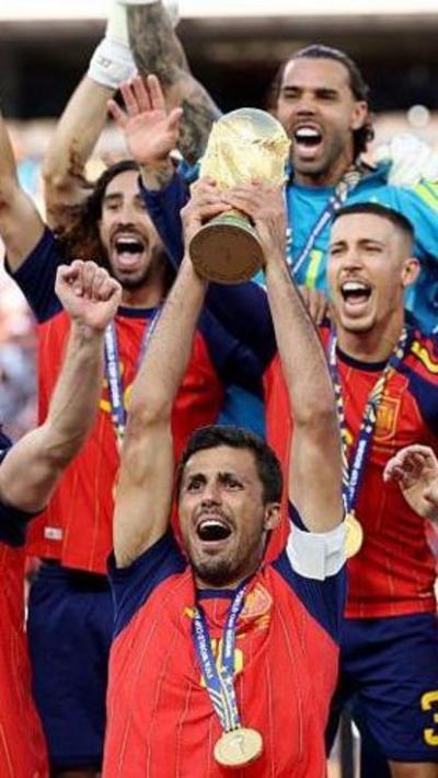 Rodri lifts World Cup trophy