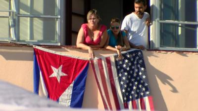 Cuban and American flags