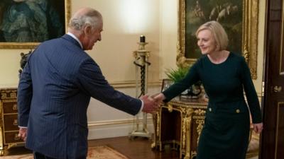 King Charles shakes hands with Prime Minister Liz Truss