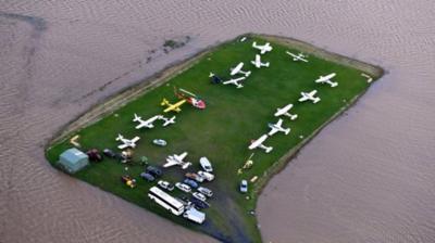 Landing strip surrounded by water