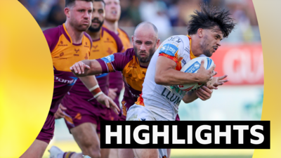 Catalans' Leo Darrelatour evades Huddersfield's Joe Greenwood & Matt Frawley