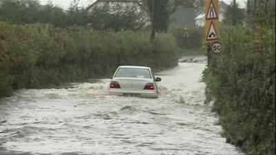 Car in flood water