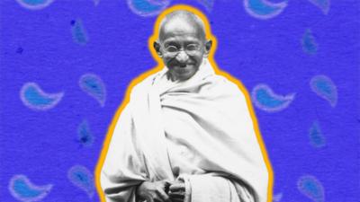 Cut out image of Mahatma Gandhi in front of a blue background