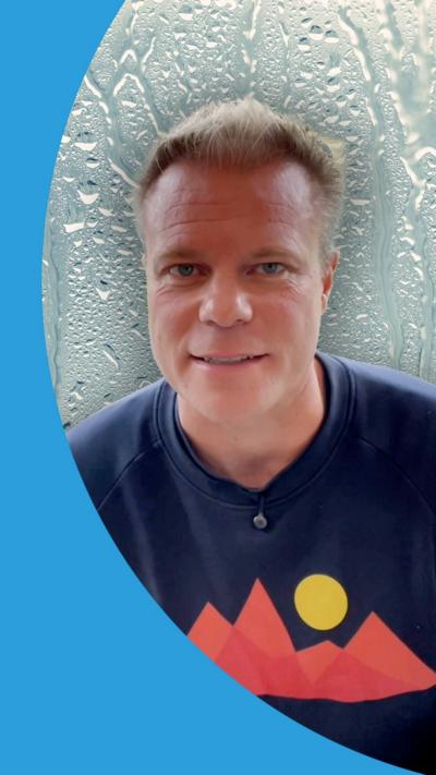 Simon King superimposed on a background of condensation on a window