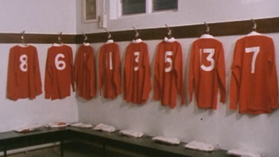 Jerseys hung up in a changing room