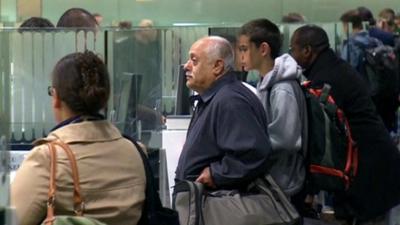 People queuing at UK passport control