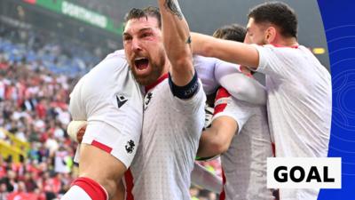 Members of the Georgia team celebrate their equaliser against Turkey 