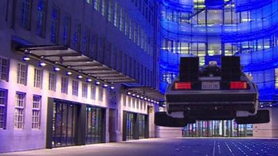 Delorean car flying through BBC Broadcasting house