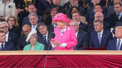 Macron, May and Trump listen as the Queen commemorates the D-Day landings