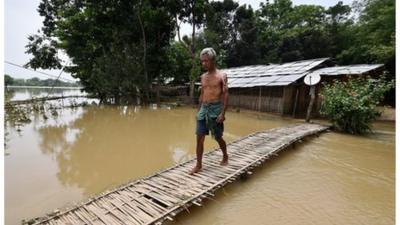 A flooded area at a village in Nagaon district, in Assam, India