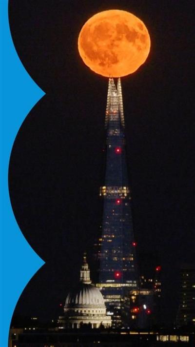A supermoon above the Shard in London