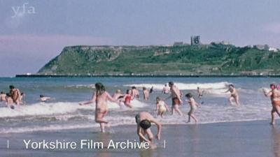 Playing in the beach at Scarborough