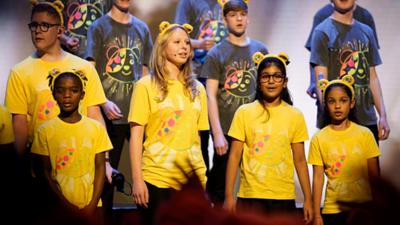 Kids singing in the Children in Need choir. 