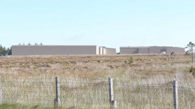 Dealbh a' sealltain mar a tha iad an dùil a bhios na togalaichean, ma thèid an togail. 