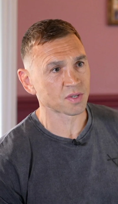 Kevin Sinfield wears a black shirt during an interview
© BBC