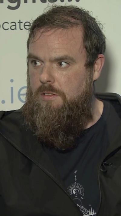 Paul Wilson with a beard and wearing a black hoody