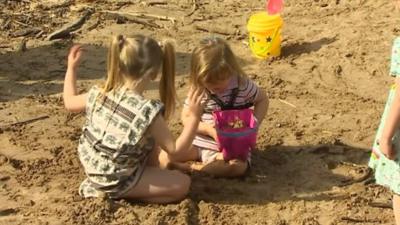 Children playing in sand