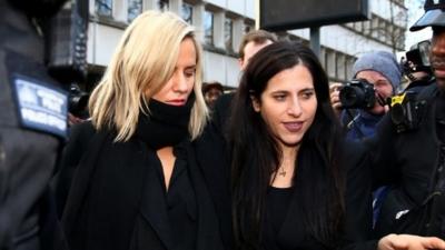 Caroline Flack (left) leaves court