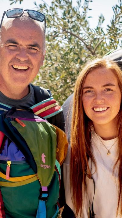 Molly and Andrew Clifford smile at the camera while taking part in Race Across the World.
