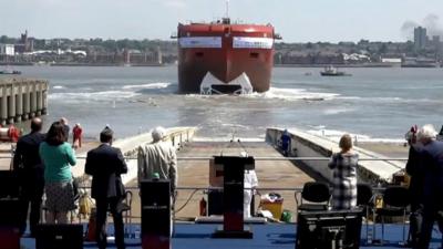 Sir David Attenborough launches the hull of the UK's newest polar ship, which is named after him.