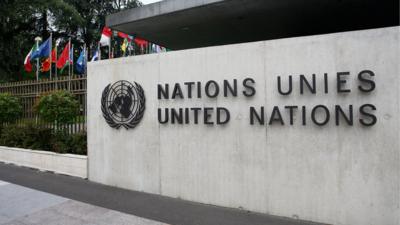 The UN sign outside the United Nations Office in Geneva