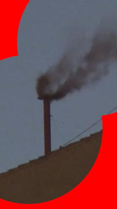 Smoke billows from the Sistine Chapel chimney