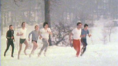 The members of Dexys Midnight Runners jogging.