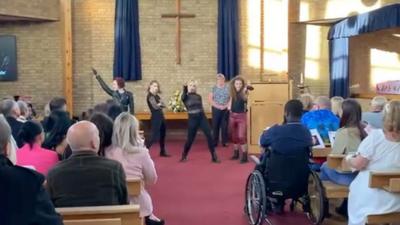 Dancers at a funeral