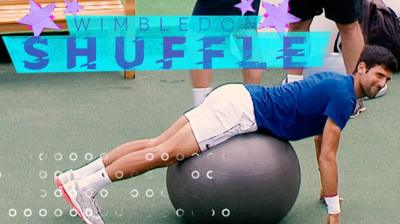 Novak Djokovic stretches on a medicine ball