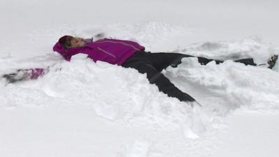 Laura Bicker doing a snow angel