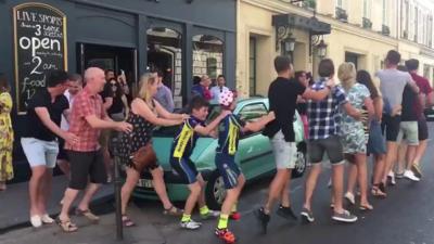 Dancing in the street - Geraint Thomas fans celebrate in Paris