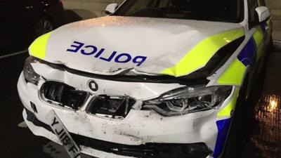 Damage to police car