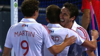 David Condon celebrates with England team-mates at EuroHockey 2015