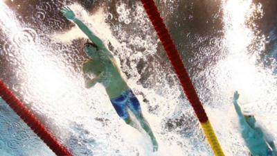 Michael Phelps in the 100 meter relay